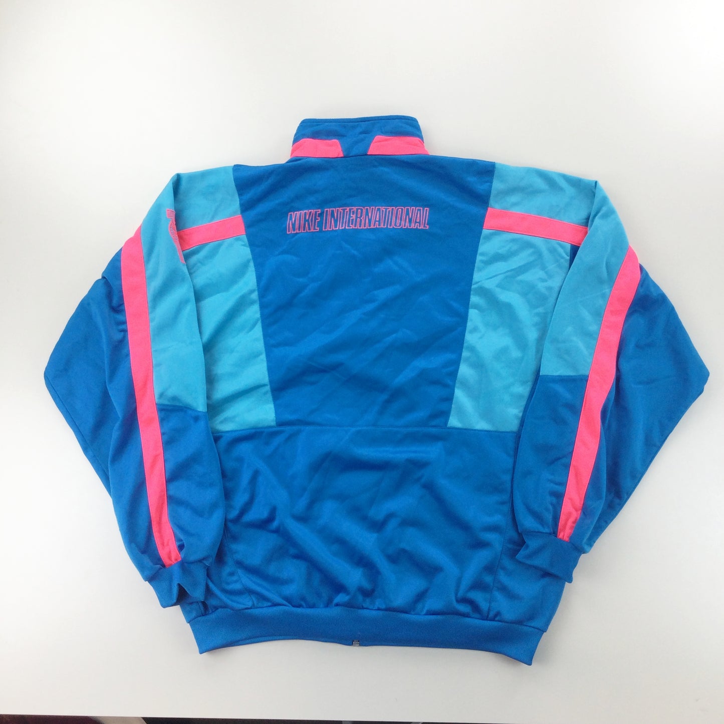 Nike 90s International Jacket - Large-NIKE-olesstore-vintage-secondhand-shop-austria-österreich